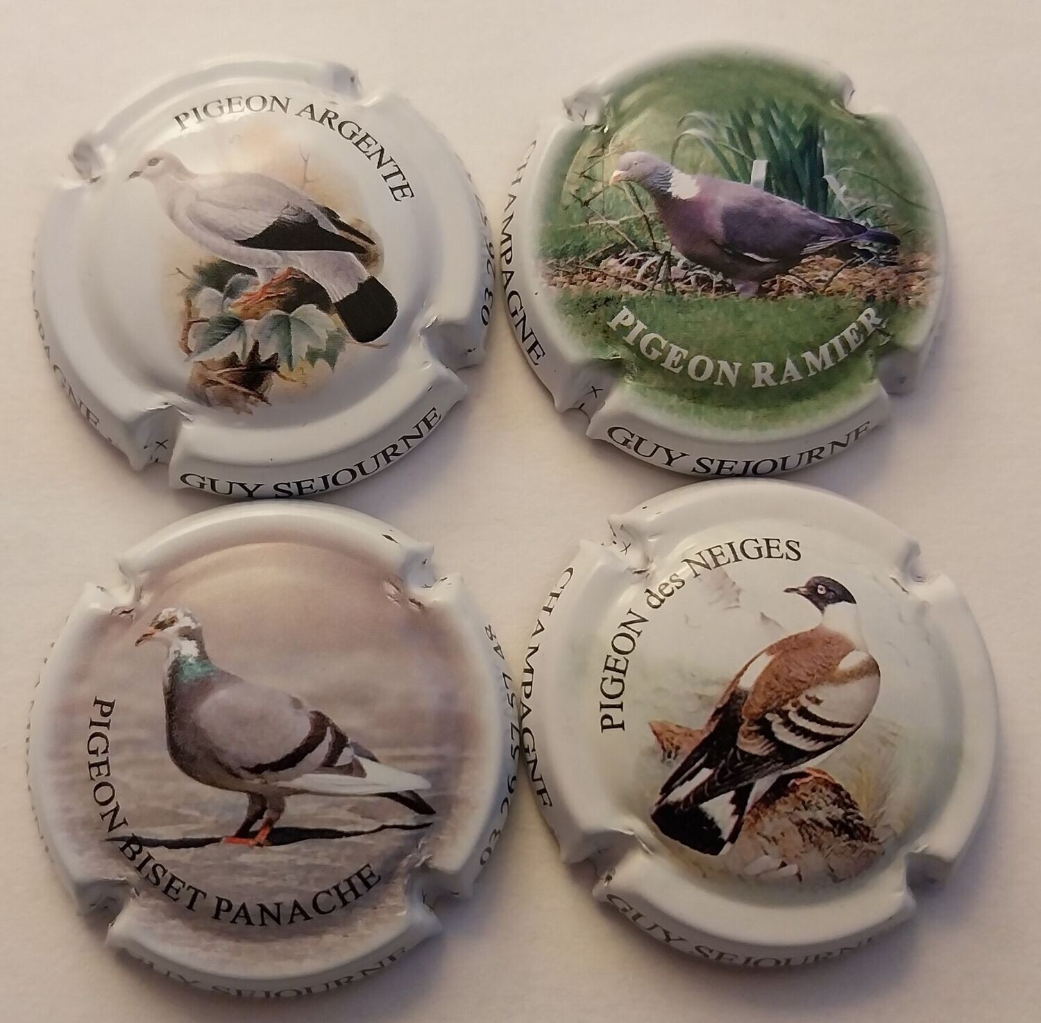4 BELLES CAPSULES CHAMPAGNE SEJOURNE GUY PIGEONS REF N°8 a 11 NEWS