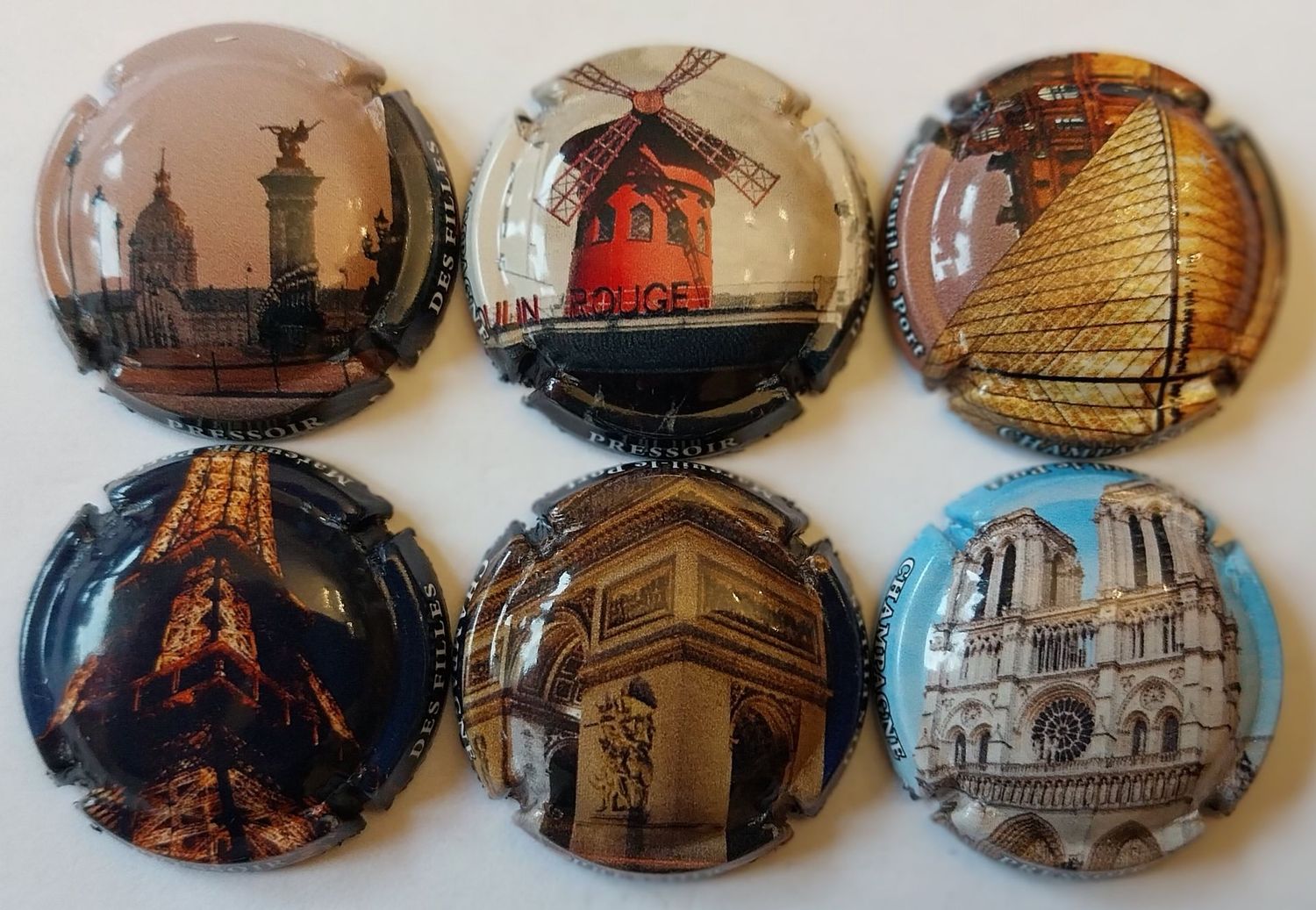 6 BELLES CAPSULES CHAMPAGNE PRESSOIR DES FILLES MONUMENTS PARIS 2024 NEWS