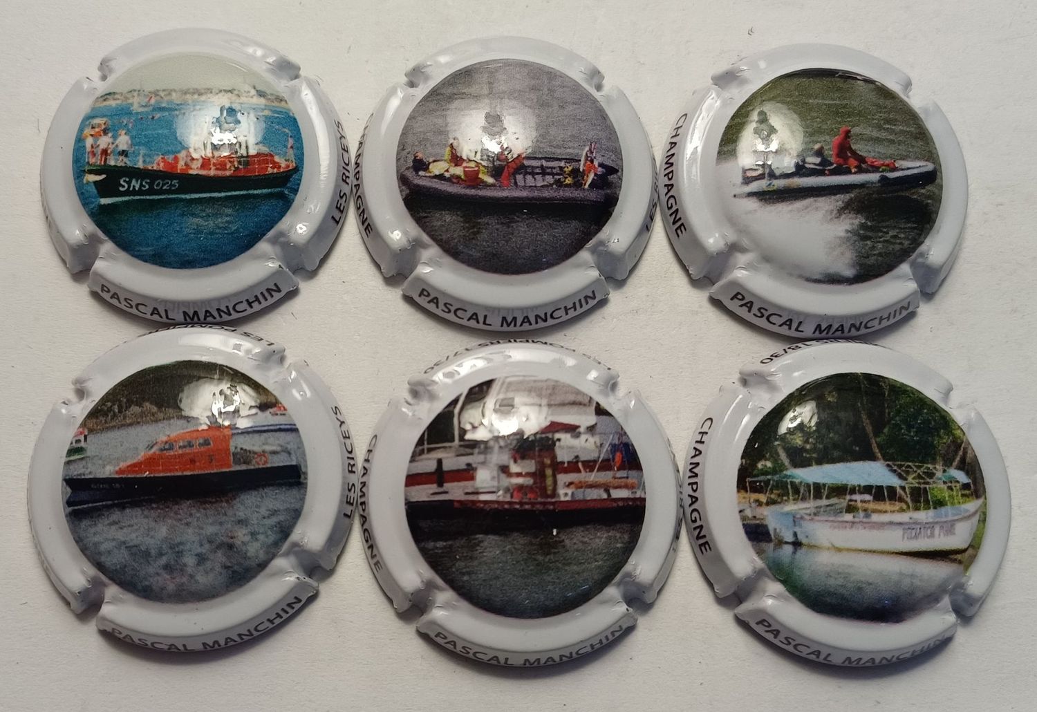 6 BELLES CAPSULES CHAMPAGNE MANCHIN PASCAL POMPIER REF N°11l a 11q NEWS