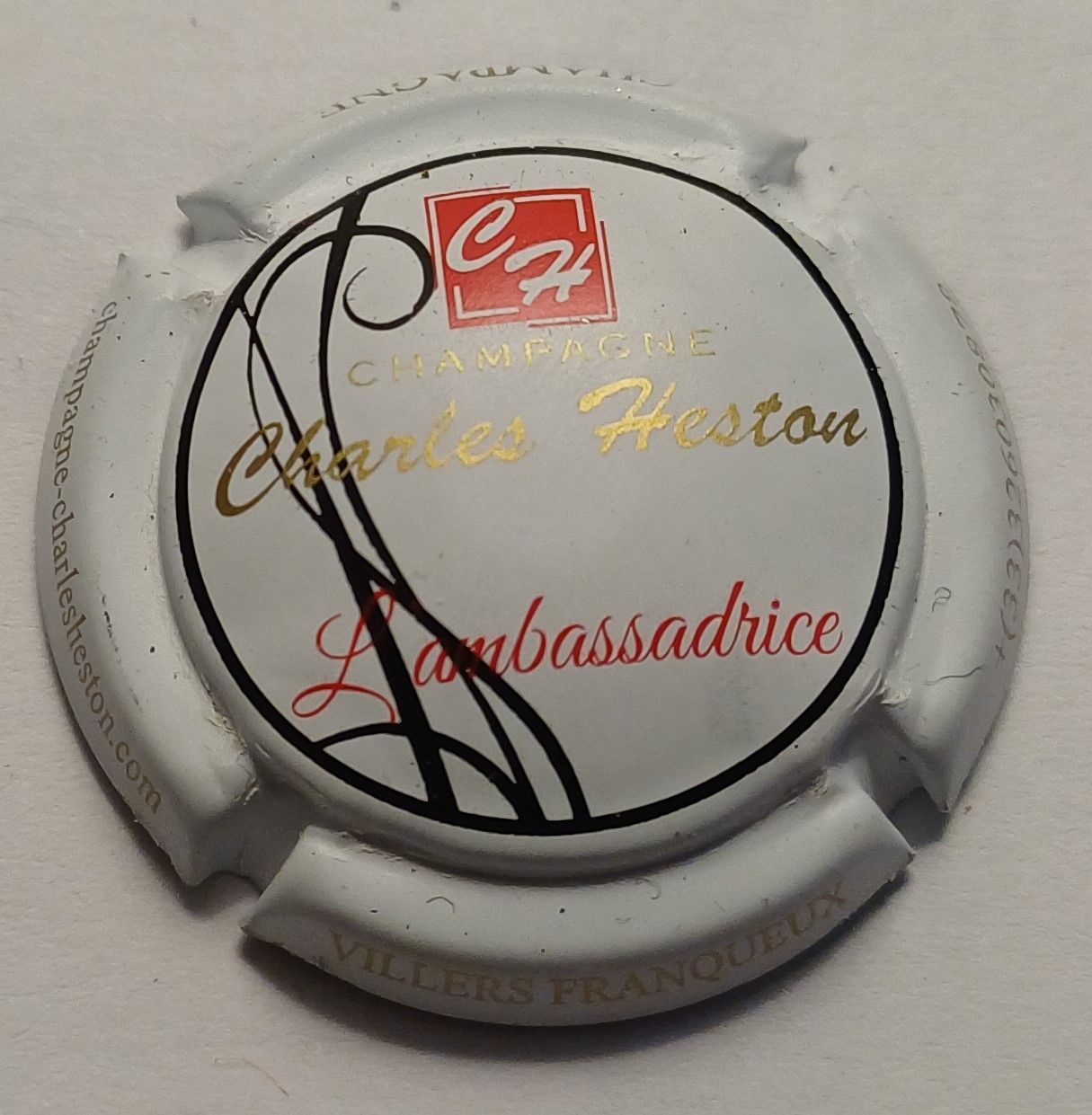 BELLE CAPSULE CHAMPAGNE SIX COTEAUX CHARLES HESTON AMBASSADRICE REF N° 57 NEWS