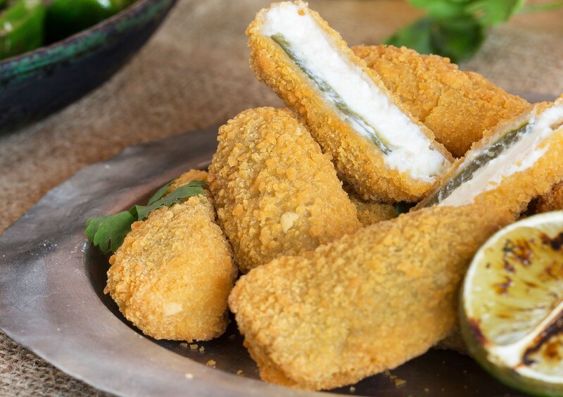 Hand stitched, orange leather long wallet.