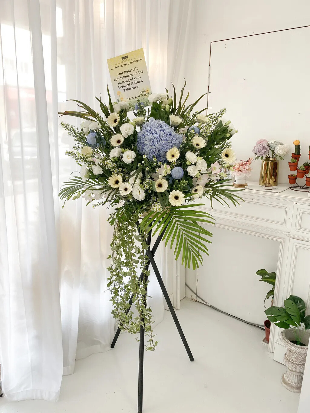 Blue Wing Condolence Flower Stand (By: Temptation Florist from Seremban)