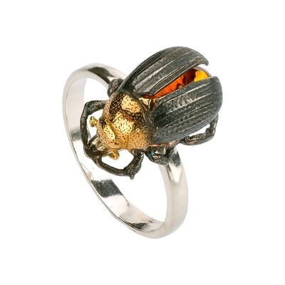 Дизайнерское кольцо из позолоченного и черненого серебра с янтарем