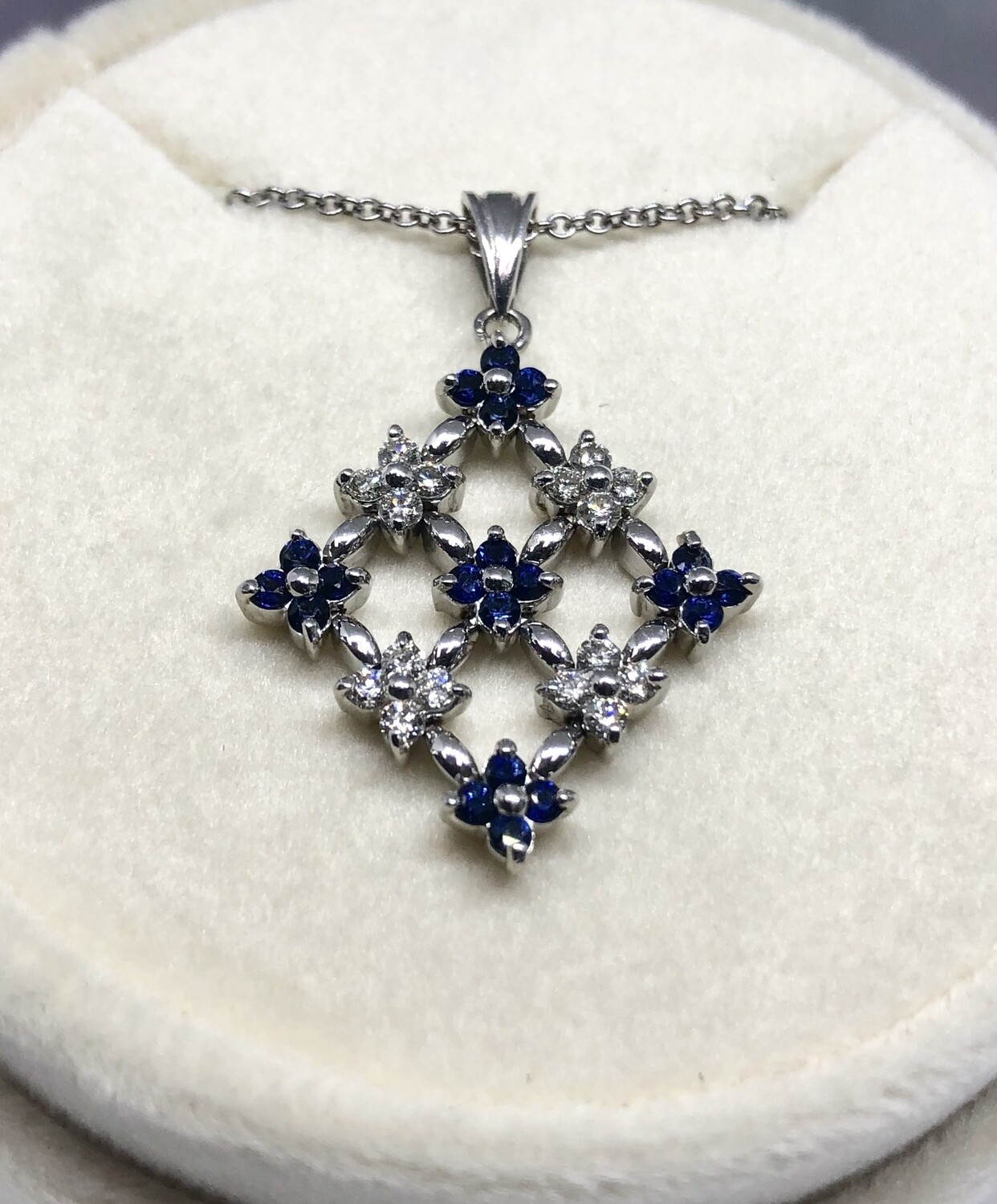 Diamonds & Sapphire set as a flower Necklace