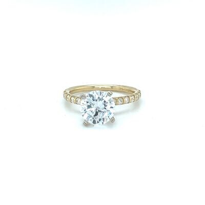 Engagement ring with bar set round diamonds