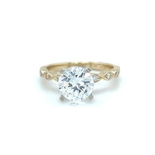 Yellow gold solitaire ring