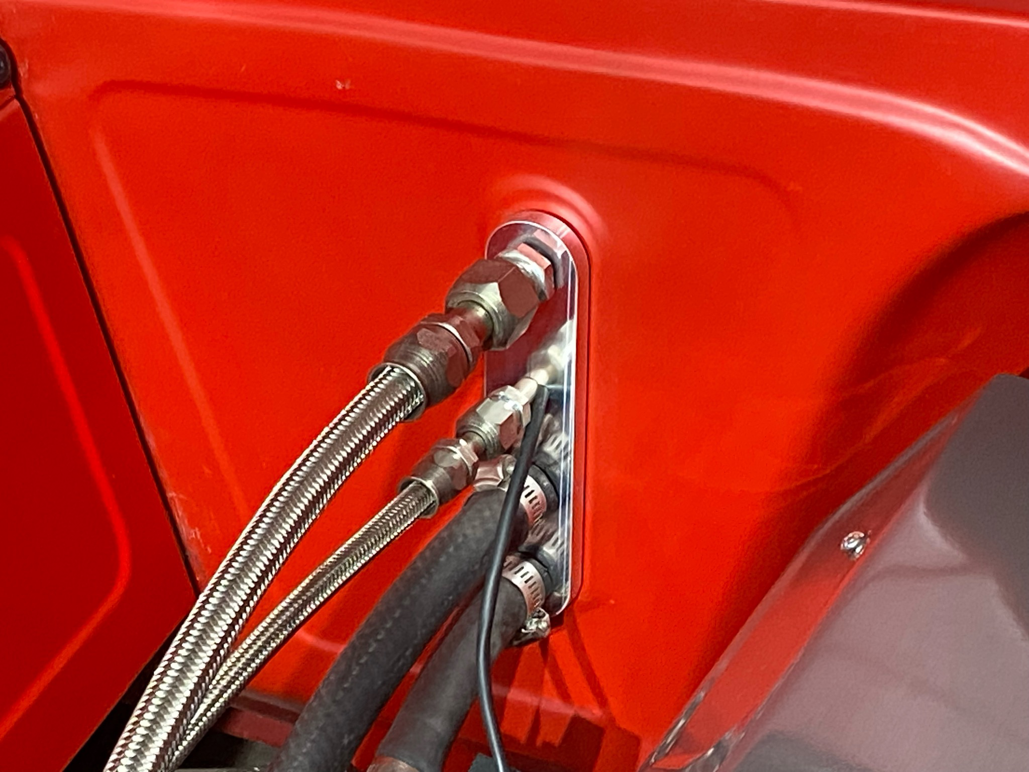 Firewall Hose Trim Plate