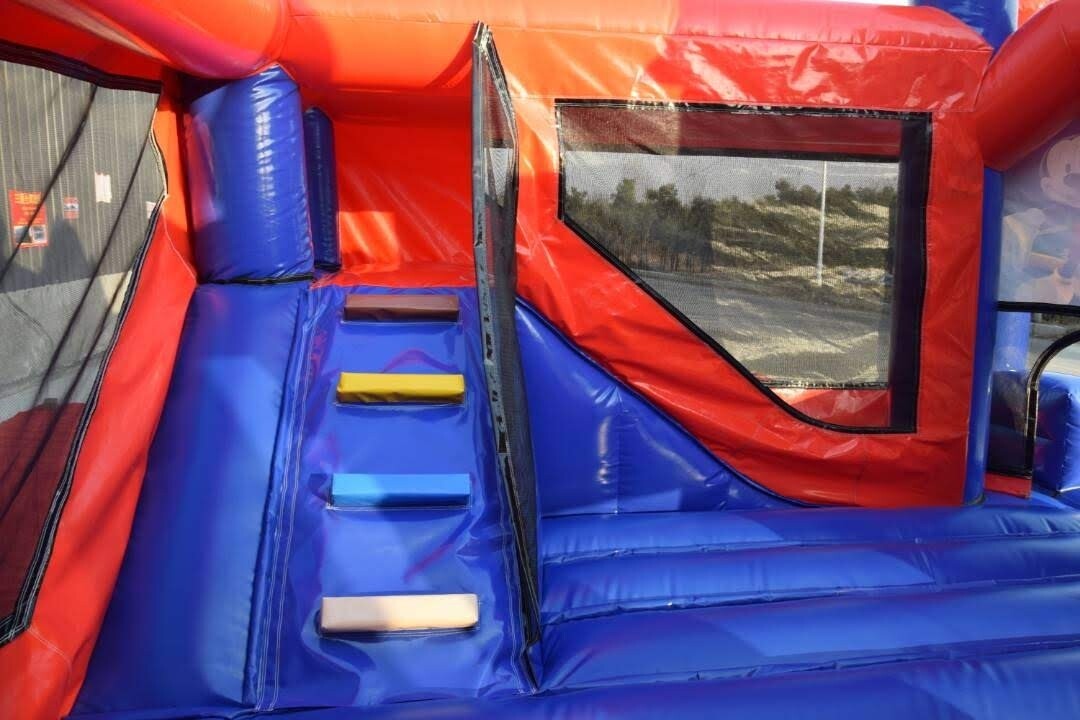 Mickey Mouse clubhouse jumping castle with slide.