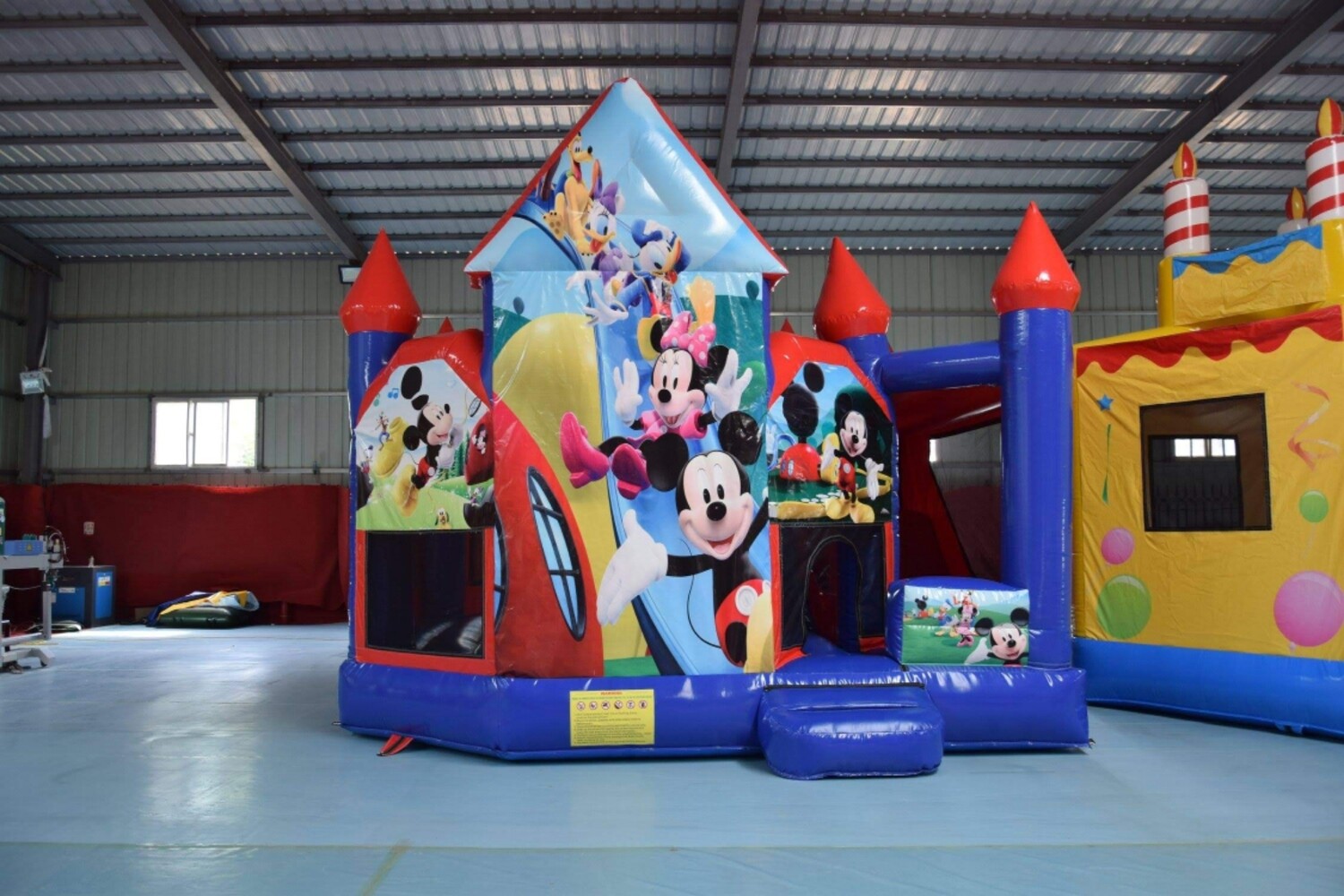 Mickey Mouse clubhouse jumping castle with slide.