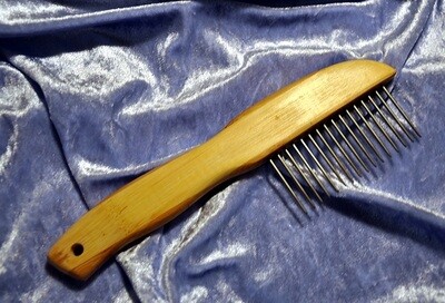 DETANGLER ''Long teeth'' comb with rotating teeth