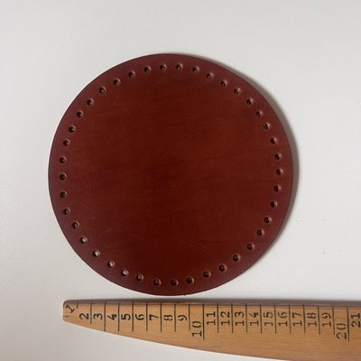 Base de piel natural color marrón 18 cm de diámetro