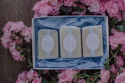 Three Sweet Orange and Patchouli 60g soaps in a gift box