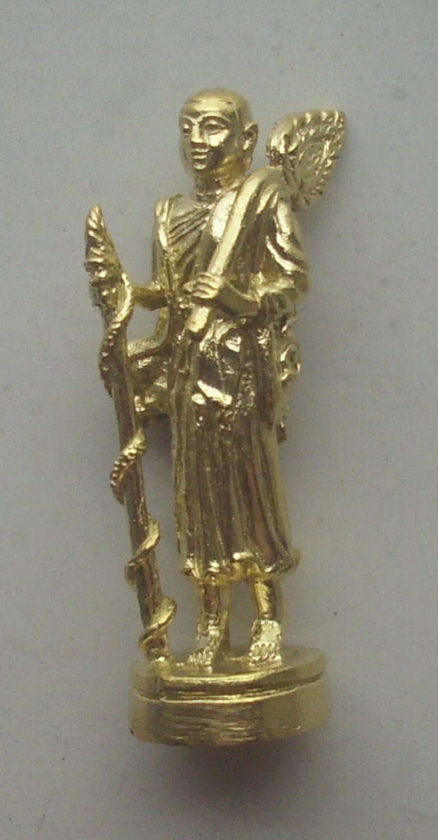 this is the real tone of the Tong Pasom metal - the pics with red backgorund decieve and make it look silver