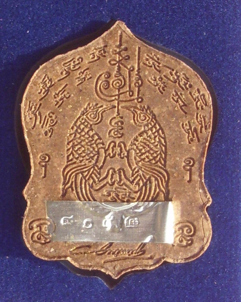 code number of authenticity on a silver plate, and a pair of Sariga Birds for extra charm power are surrounded by sacred kata in Devanaghiri lettering