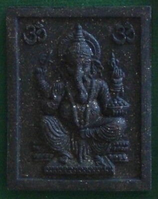 Ganesh to remove obstacles and bring success and completion - Maha Tep Normo amulet has this on the rear face - filled with sacred powders and other luck bringing ingredients, a massive Putta Pisek ceremony ensured that the Maha Tep[ Normo amulets are strong wealth bringing magic amulets.
