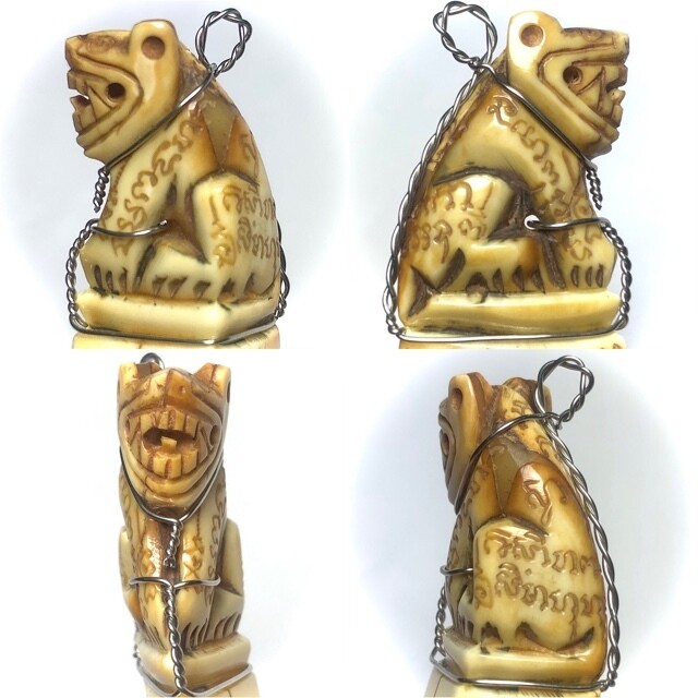 Khiaw Hmoo Dtan Gae Suea Wild Boar Tusk with Carved Tiger Amulet