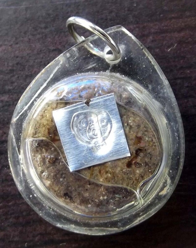 'Chin Aathan Bpatamang Lokee' - Luan Hnaa Phaag (forehead) Relic with Pong Sanaeh Ya Faed and Takrut in Prai Oil 'Ruay Sap Ruay Sanaeh' Edition 2554 BE - Pra Ajarn Oe Putto Raksa