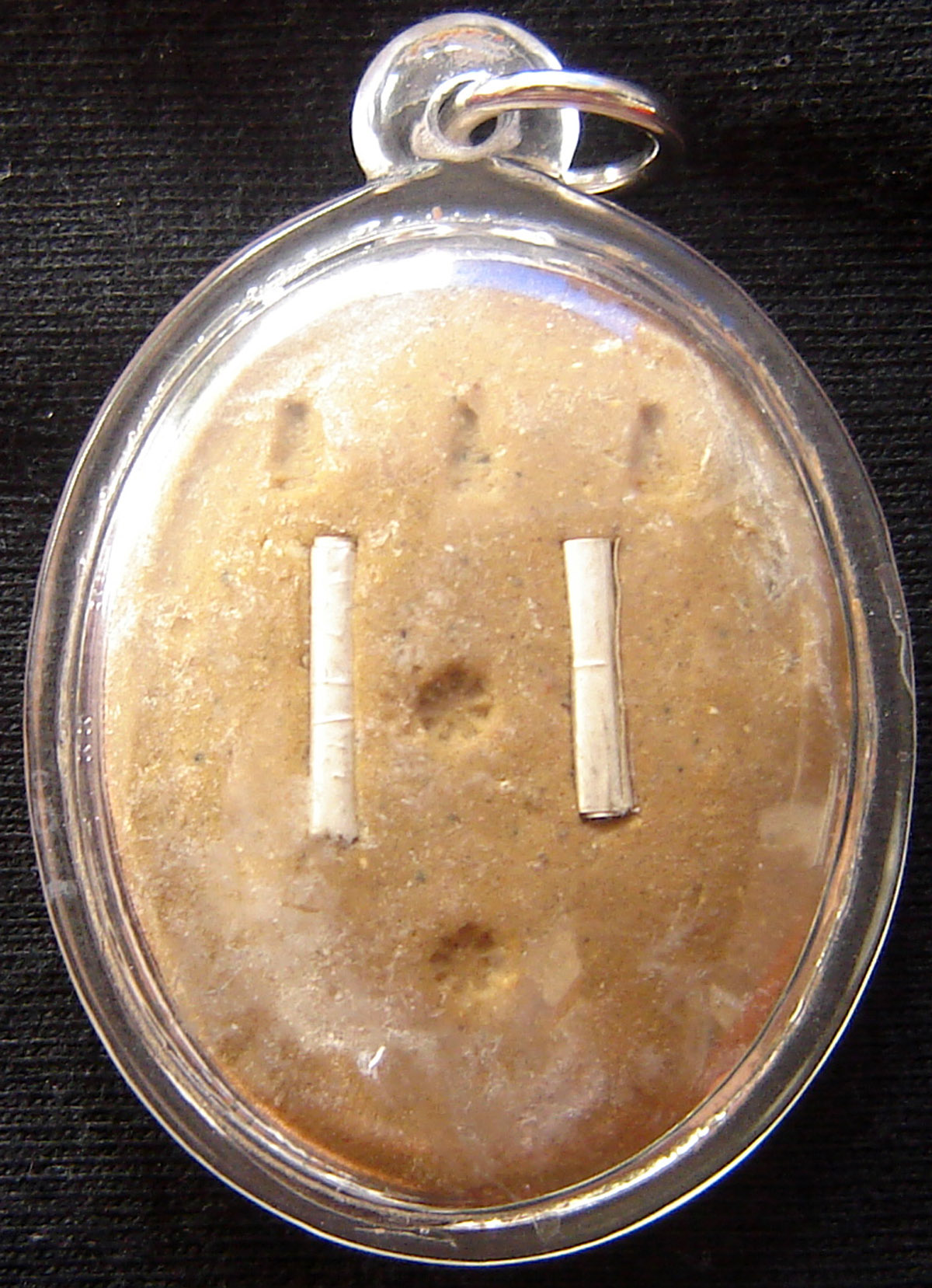 Rian Paya Ngang Saen Sanaeha - Nuea Tong Daeng Pork Pong Sanaeha 2 Takrut Roi Choo (Albaca with two '100 Lovers Takrut' and Maha Sanaeh powders in rear face) in Waterproof Casing - Ajarn Kom Traiwaet