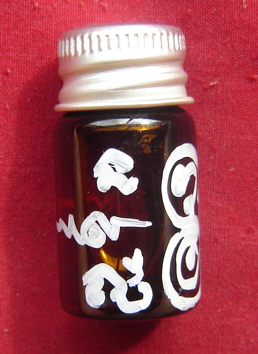 Nam Man Suea Phu Hying Khuad Kroo (Ladykiller Tiger charm Oil) - Luang Phu Bpan Gadtabano - Wat Na Dee