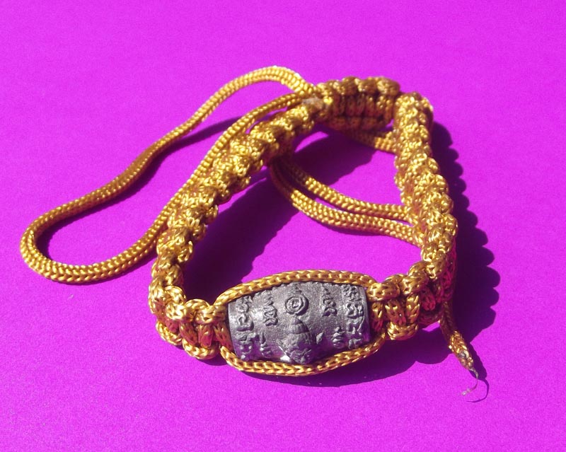 Look Sakot Khor Mer Nang Pim  Prai Spirit in bead Takrut bracelet for riches and protection, winning punitive disputes - Run Sao Ha 2553 BE - Luang Phu Ap