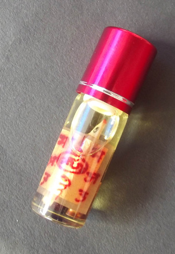 Nam Man Sariga Lin Tong Rum Rak Maha Hlong (Sariga Bird Metta Charm Oil with Sacred Yantra and Takrut Spell) - Convincing Talker Magic - Pra Ajarn Taep Pongsawadarn