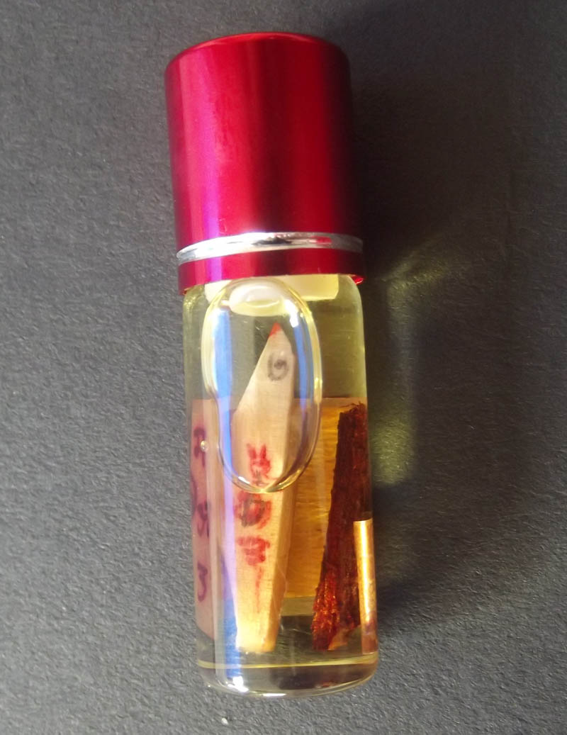 Nam Man Sariga Lin Tong Rum Rak Maha Hlong (Sariga Bird Metta Charm Oil with Sacred Yantra and Takrut Spell) - Convincing Talker Magic - Pra Ajarn Taep Pongsawadarn
