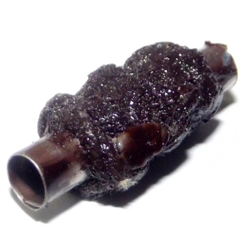 Takrut Sanaeh Joong Nang Dtanha Khao Hong Jum Nam Man Wan Dork Tong (Kama Sutra Love Amulet soaked in Charm Oil) - Pra Ajarn Dtee Yai - Wat Ban Sri Sukh