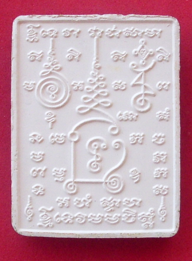 Na Metta and other sacred charms are inscribed into the back face as sacred Na and Yant