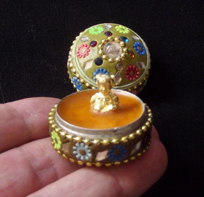 Kumaree (Female Kumarn Tong) in See Pheung Metta Balm in bejewelled container - Luang Por Dam - Wat Pra Puttabat Radtana Kiree