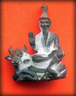 Ruesi Isworn Song Ko (Shiva Ruesi sitting on sacred Nonti Cow)  Thai Brahman amulet - Luang Phu Nong, Wat Wang Sri Tong - Nuea Radtana Loha
