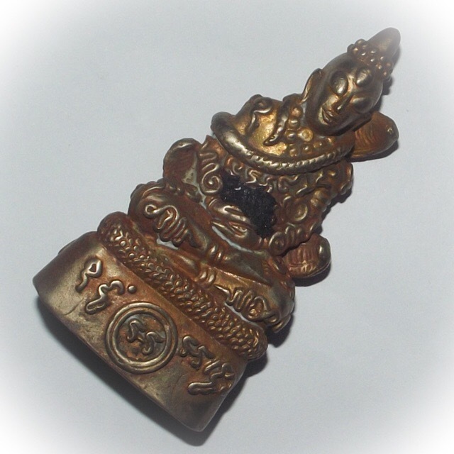 Pra Ngang Hmeun Montr (Ngang with ten thousand prayer incantations) - Nuea Albaca Fang Takrut Diaw (single Takrut spell) - 3 inches high - Ajarn Kom Traiwaes 2554 BE