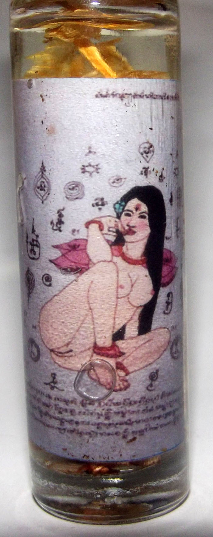 Nam Man Tida Taep - 13 Lustful Nymphs Aphrodisiac Oil - 'Hoo Mee Kam Thaam' (cocking a leg) - Ajarn Khwan Chai Intra Paet