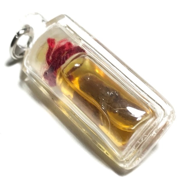 Hua Chuea Nam Man Prai Phii Dtaay Tang Glom with Dork Tong Herb Encased for Bucha Ajarn Somsak