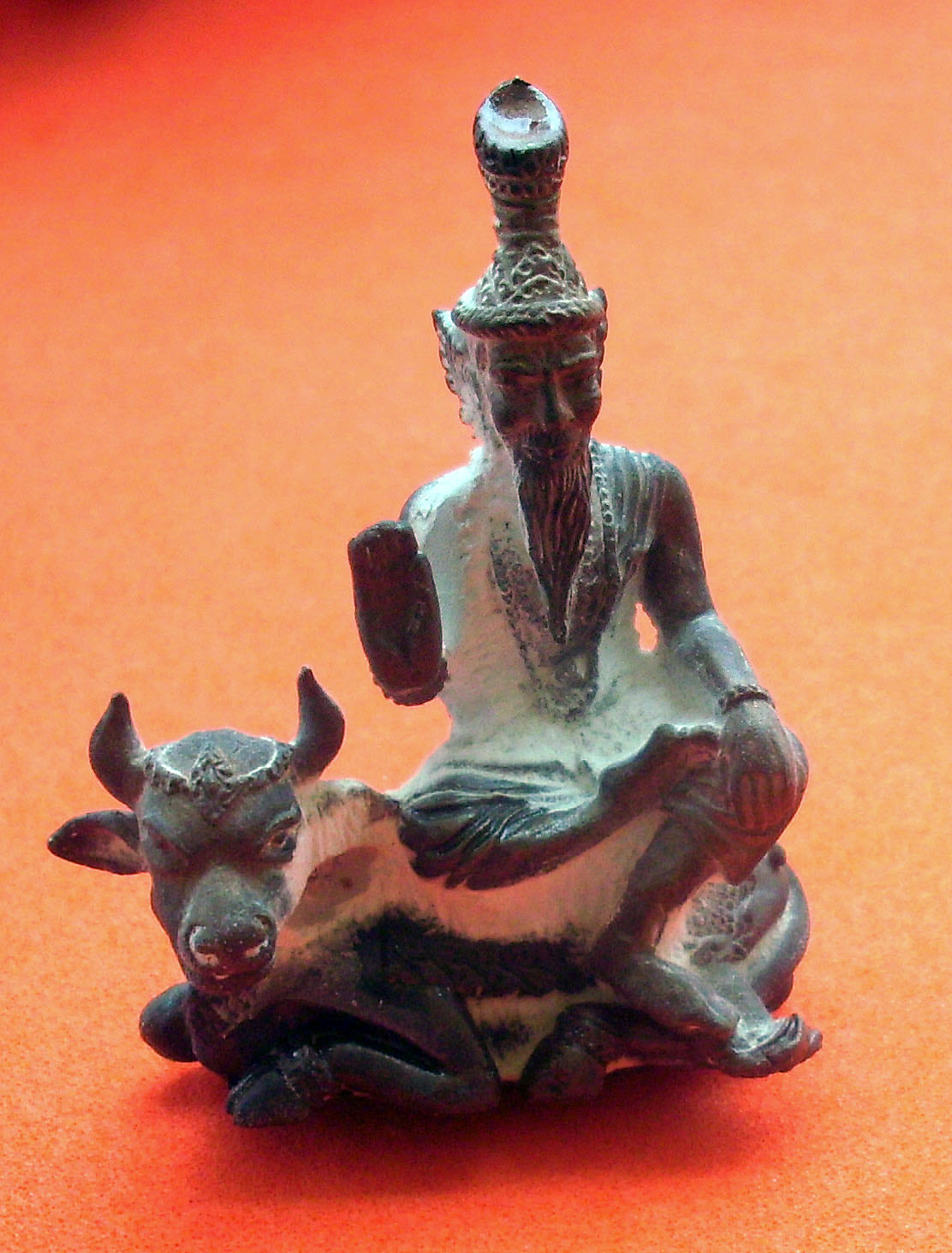 Ruesi Isworn Song Ko (Shiva Ruesi sitting on sacred Nonti Cow) Thai Brahman amulet - Luang Phu Nong, Wat Wang Sri Tong - Nuea Radtana Loha