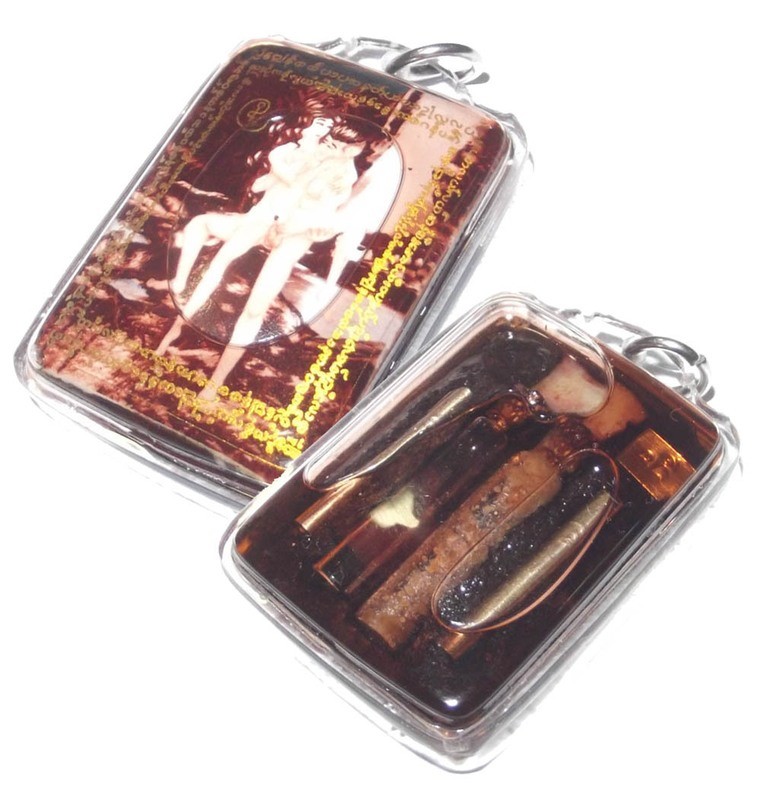 Locket In Bia Ongk Kroo in Nam Man Prai Oil with Ban Neng bone carving, 2 Takrut, Pong Sanaeh Ya Faed Powderflask, and Elephant Oil - AC Apichai Decha Locket In Bia Ongk Kroo in Nam Man Prai Oil with Ban Neng bone carving, 2 Takrut, Pong Sanaeh Ya Faed Powderflask, and Elephant Oil - AC Apichai Decha
