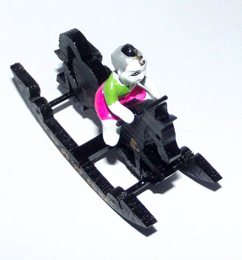 Kumarn Tong Riding a Rocking Horse - Prai Kumarn Bone Powders, Ashes and Earths - Dtraimas 2556 BE - Luang Por Dam - Wat Pra Puttabat