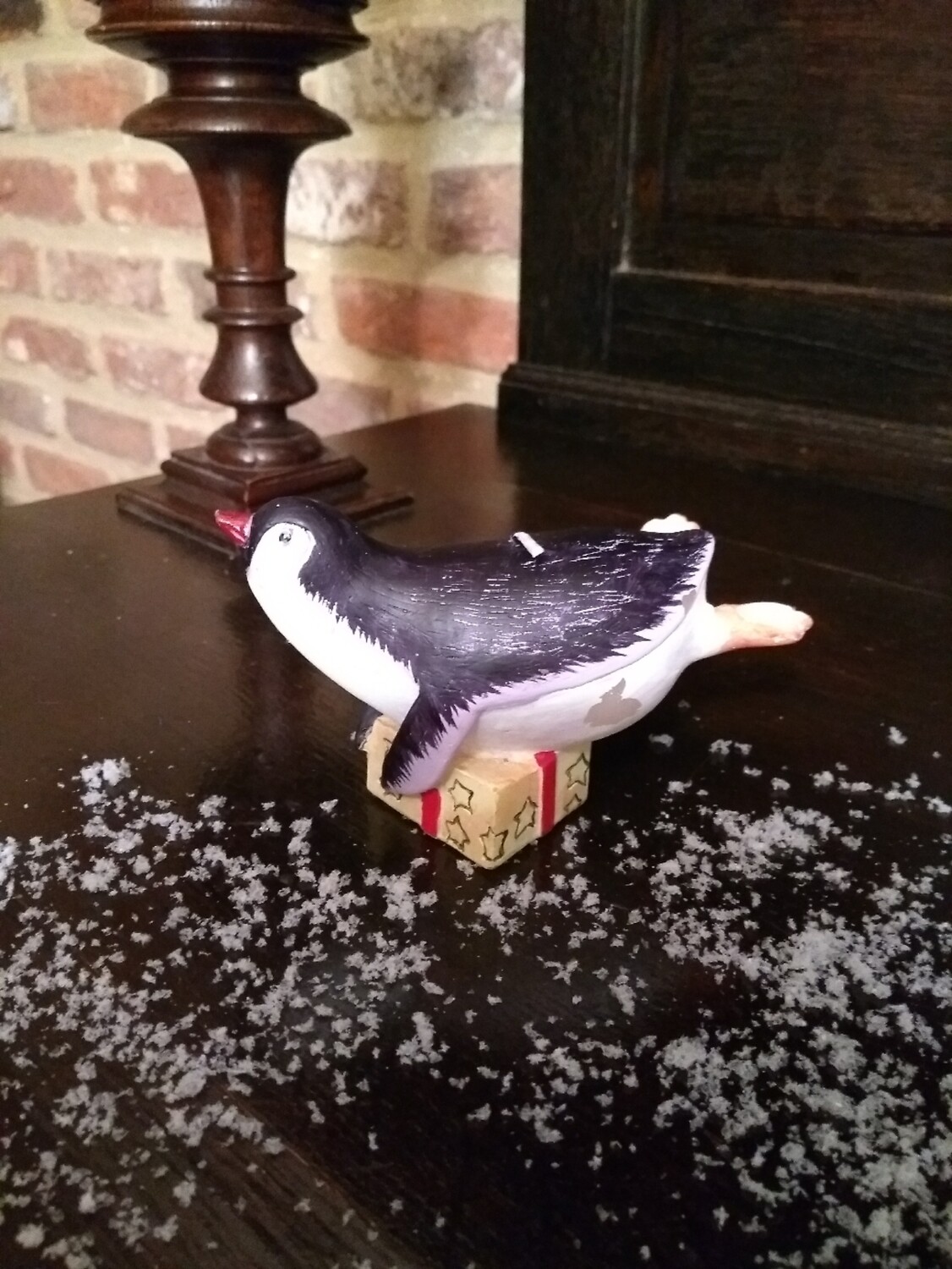 Kaarsje pinguïn liggend