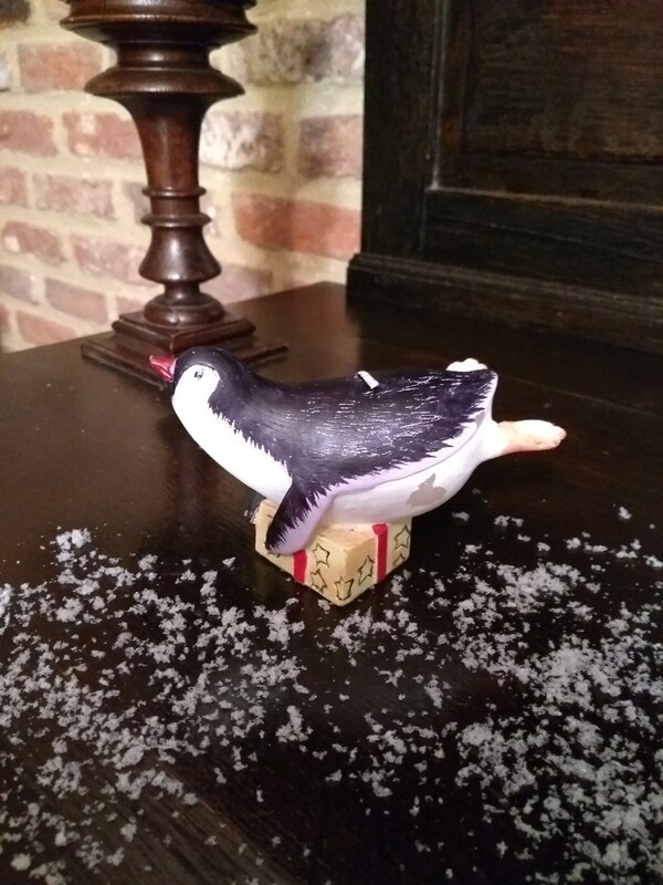 Kaarsje pinguïn liggend