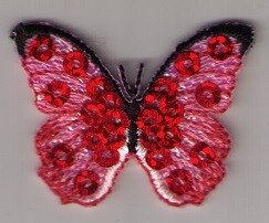 Applicatie kleine rode vlinder met pailletten
