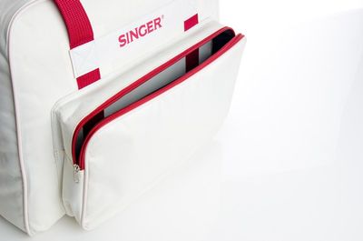 Draagtas Singer cream/red