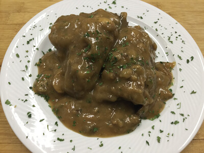 HOOFDGERECHT: stoofpotje van varkenswangetjes