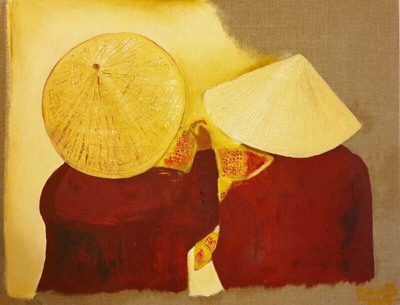 Joie sous le chapeau de paille