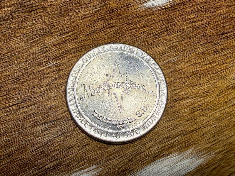 Midnight Star “$1” Gaming Token (Silver-Tone) — NCM Mint Mark