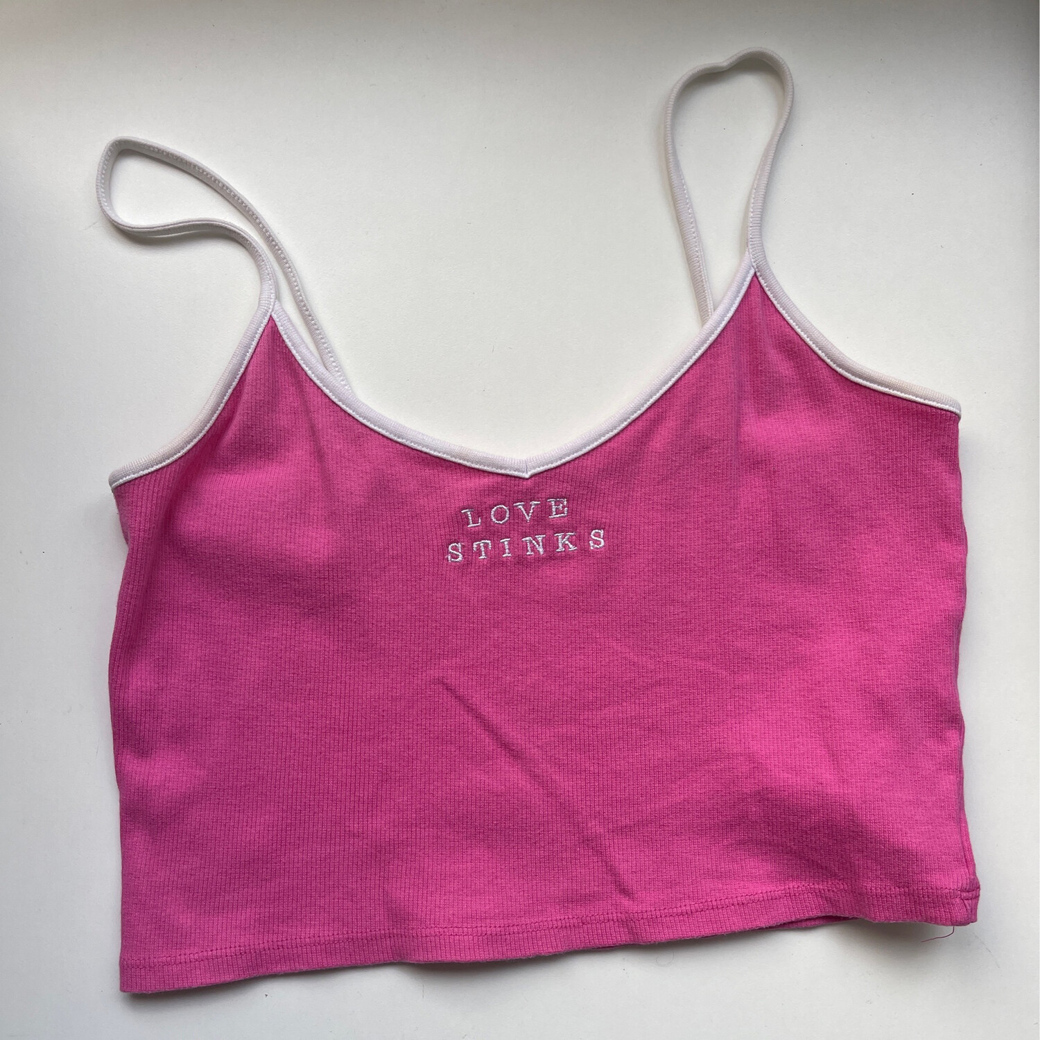 Cotton On ‘Love Stinks’ Cropped Singlet in Pink with White Detail