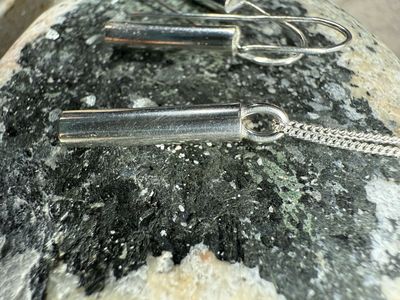 Sounding Pendant: A Minimalist Silver Column Pendant Sounding Pendant: A Minimalist Silver Column Pendant