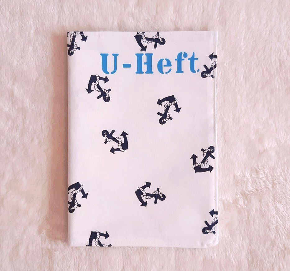 U-Heft-Hülle weiß mit blauen Ankern