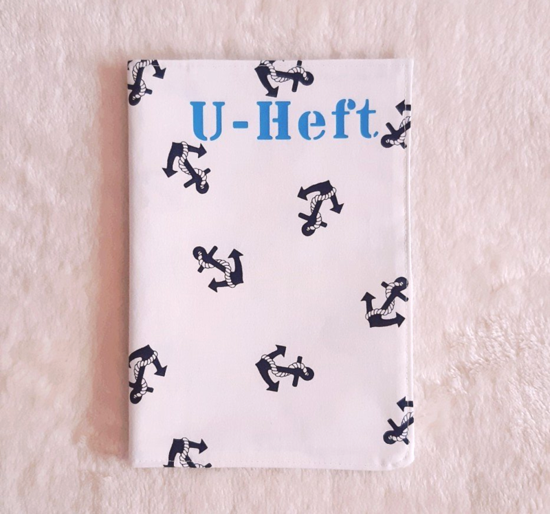 U-Heft-Hülle weiß mit blauen Ankern