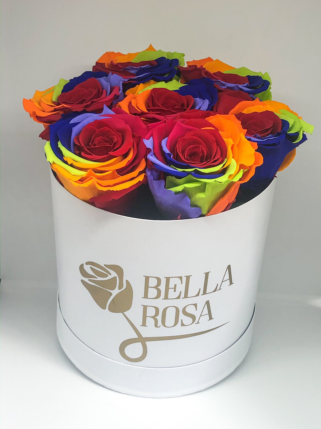 Caja redonda con 7 rosas preservadas multicolor