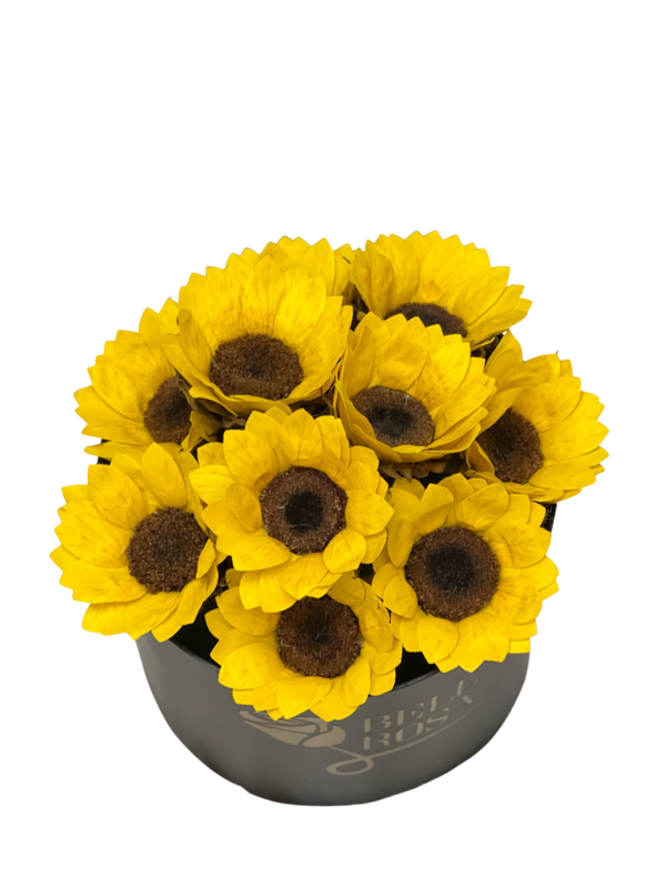 Caja redonda con girasoles preservados