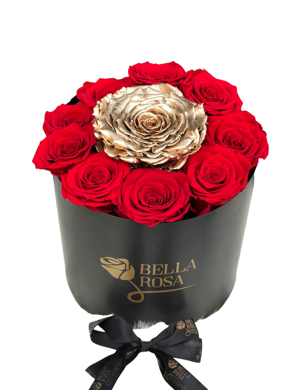 Caja redonda, blanca o negra con 9 rosas LL y una Xl
